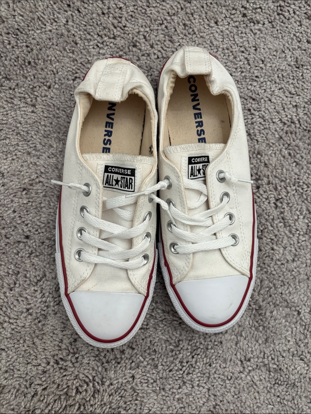 Converse women’s White Canvas Low-Top Sneakers with Red Trim